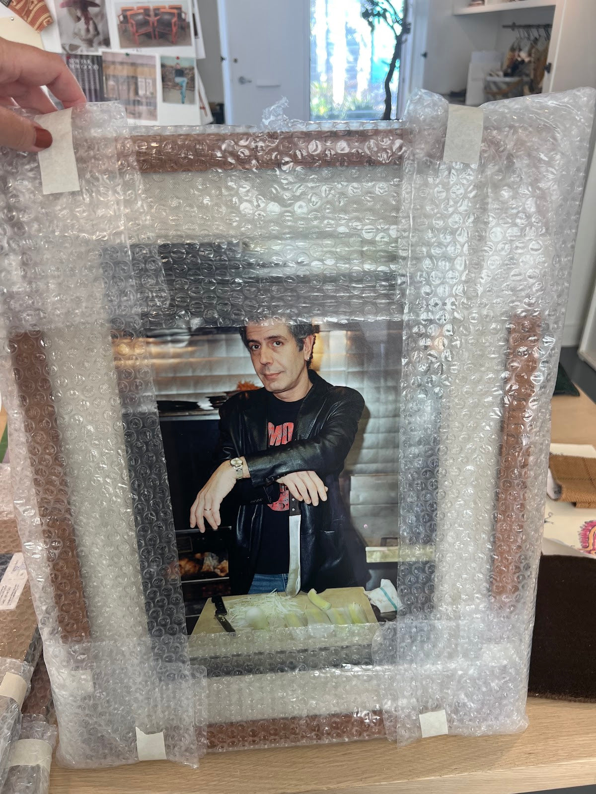 Anthony Bourdain with Cutting Board